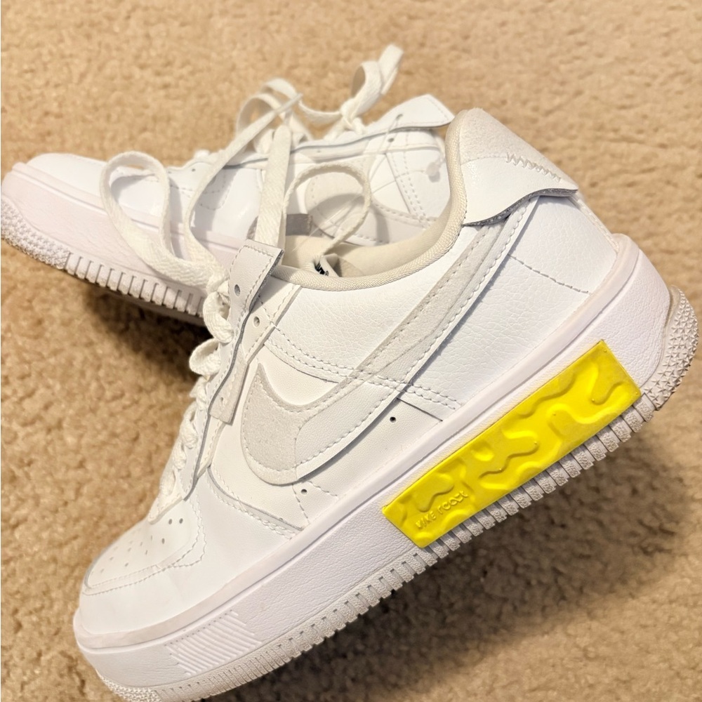 Nike White Sneakers with Yellow Accent